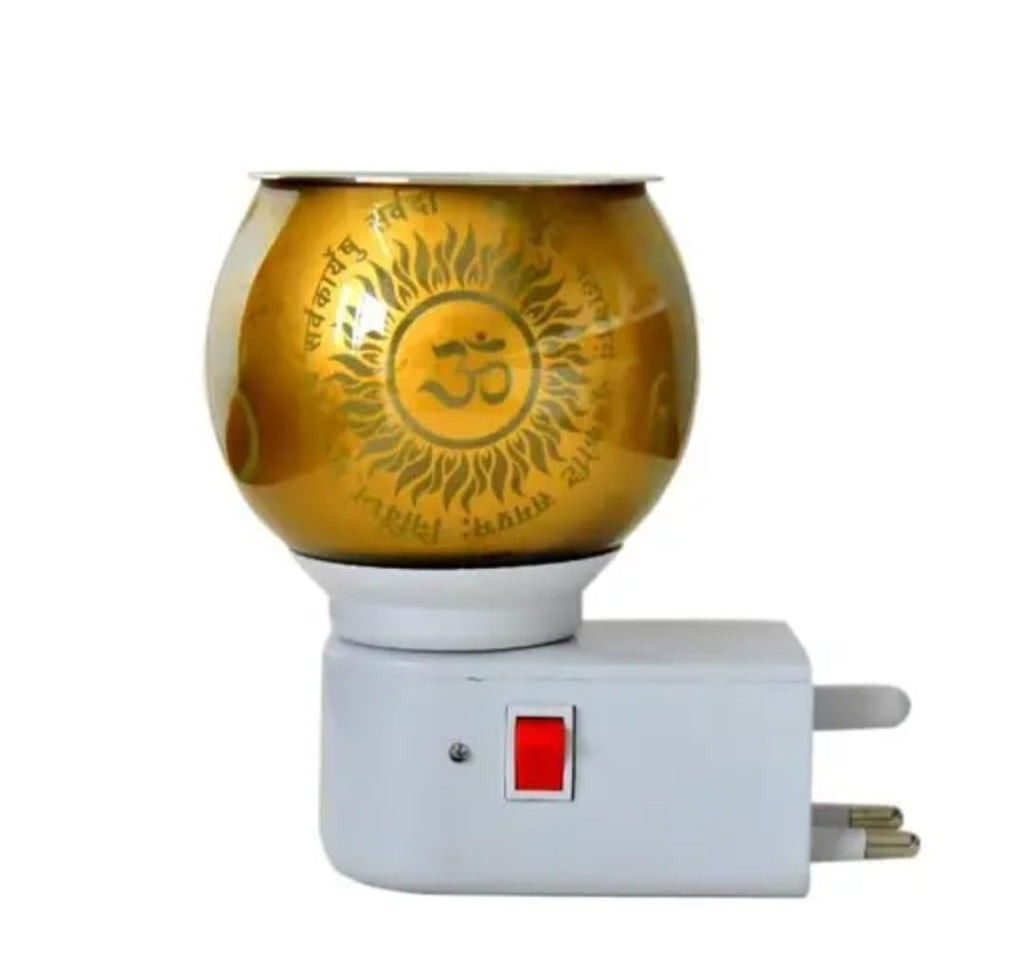 Electric Aroma Oil Diffuser Lamp with Ganesha and Om Design, Plug-in Night Light, Warm Golden Glow