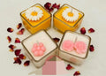 Decorative Floral Scented Candles Set, Square Glass Holders with Daisy and Rose Designs, White and Pink, 4 Pack