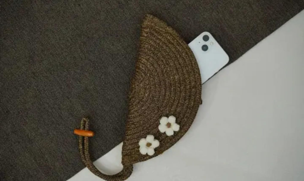Handwoven Straw Clutch Purse with White Floral Accents, Brown, Half-Moon Design