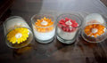 Decorative Floating Candle Set with Artificial Daisy Flowers, Glass Votive Holders, Yellow Orange Pink White, 5 Pieces