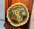Handcrafted Sikh Religious Wall Decor,resin art, Pearl-Bordered Khanda Symbol Frame with Gold Accents, Black Background, Traditional Spiritual Art
