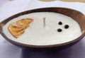 Handmade Coconut Shell Bowl candle, White Interior with Orange Fruit Design, Natural Wooden Edge, Decorative Serving Dish