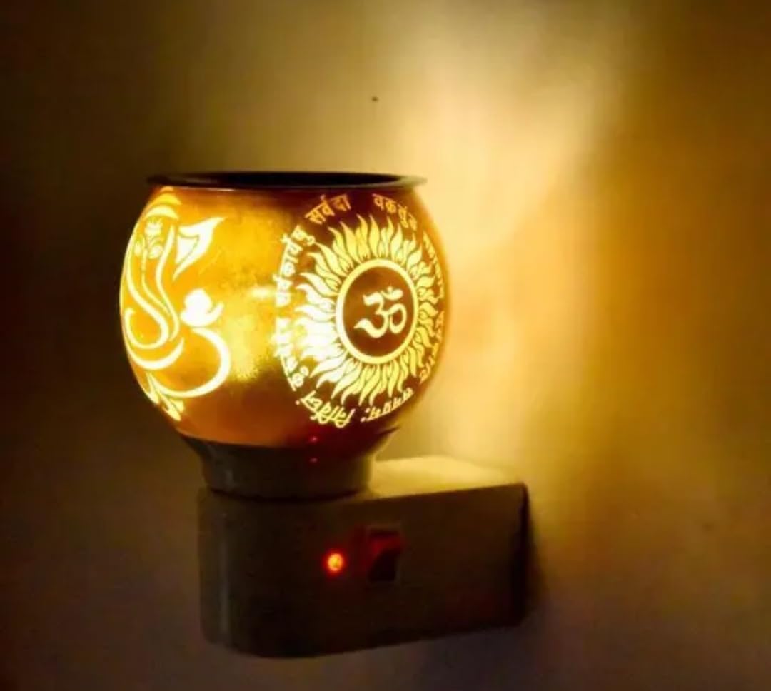Electric Aroma Oil Diffuser Lamp with Ganesha and Om Design, Plug-in Night Light, Warm Golden Glow