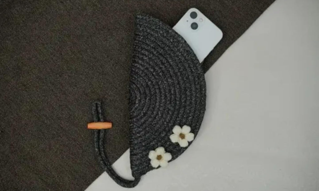 Handmade Crochet Semicircle Clutch Purse with White Flower Accents, Black