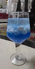 Blue Gel Candle in Clear Wine Glass, Decorative Ocean-Themed Table Centerpiece